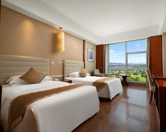 Empark Grand Xishuangbanna - Xishuangbanna - Habitación
