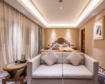 Sunny Hotel - Taizhou - Schlafzimmer