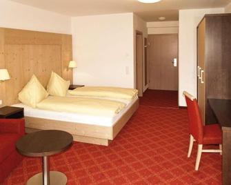 Klawunn Hotel & Apartement - Zell am See - Makuuhuone