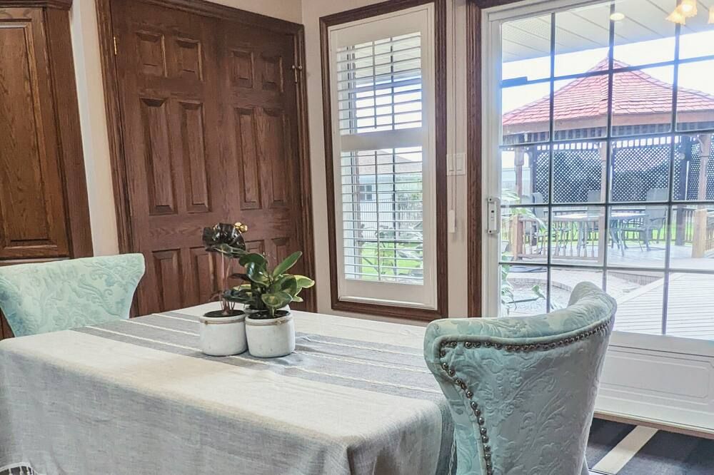 Restaurant view of A poolside guest suite nested in a beautiful orchard along winery route