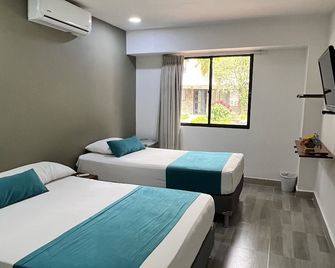 Hotel Boutique Plaza - Medellín - Habitación