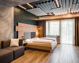 هوتل كرون - إيت، درينك، ستاي - Bressanone/Brixen - غرفة نوم