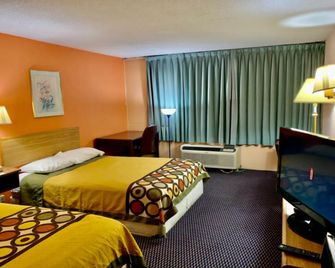 Red Carpet Inn and Suites Lima - Lima - Schlafzimmer