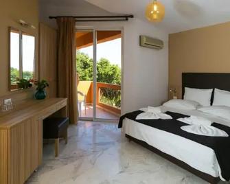 Marina Boutique Hotel - Moraitika - Schlafzimmer