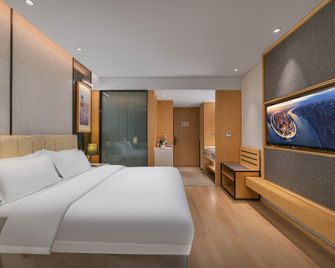 Jinjiang Metropolo Hotel Hangzhou Huanglong Wensan Road Branch - Hangzhou - Habitación