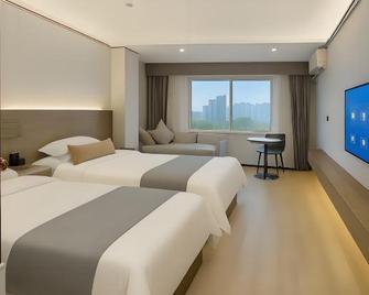 Hainan Tengpeng Hotel - هايكو - غرفة نوم