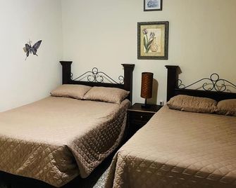 Hostal Los Volcanes - Guatemala City - Kamar Tidur