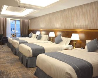 النخبة رويال إن - المدينة المنورة - غرفة نوم