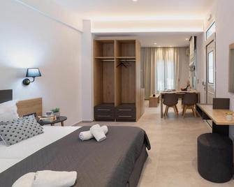 Petani beach suites - 보비케스 - 침실
