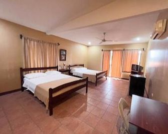 Hotel Belén Suites - Heredia - Schlafzimmer