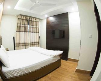 Karakuram Hotel & Restaurant - Mānsehra - Bedroom