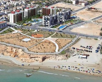 1st line, terrace with sea view and swimming pool For 2 people - Pilar de la Horadada - Edificio