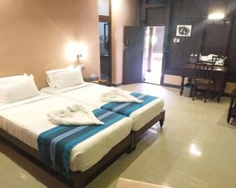Green Meadows Resort - Chennai - Schlafzimmer