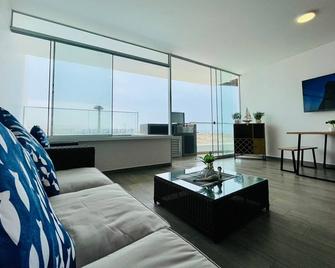 A 3 minutos de la Playa Hermoso Departamento con Piscina y Parrilla - Asia - Living room