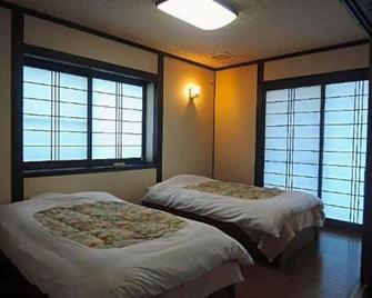 Inn Mizuwakemura - Kokonoe - Schlafzimmer