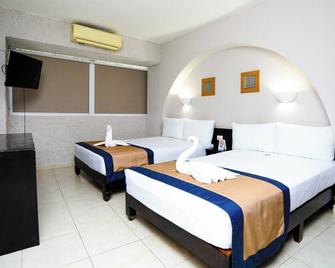 Hotel Caribe Internacional Cancun - Cancún - Slaapkamer