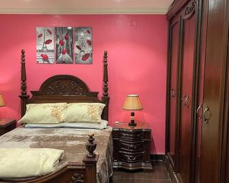Fancy Cozy 2-bedroom apartment in enjoyable Cairo Governorate with AC, WiFi - El Cairo - Habitación
