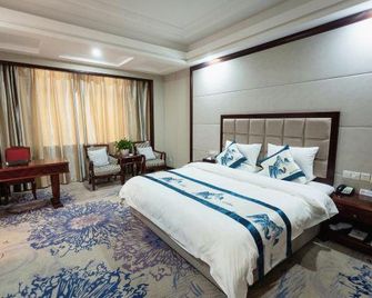 Guoyuan Hotel - Taizhou - Bedroom
