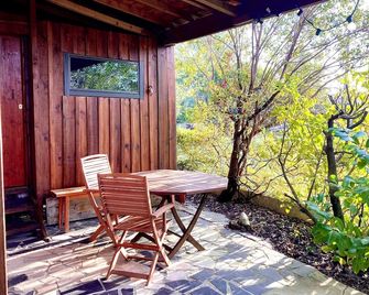 Cabin 5 minutes from the ocean! - Le Porge - Patio
