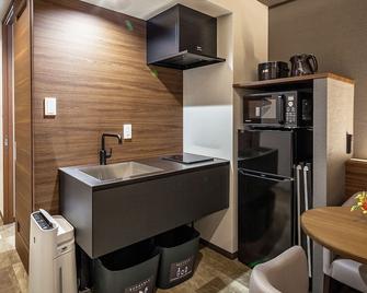 Kariyushi Condominium Resort Grand Stay - Naha - Küche