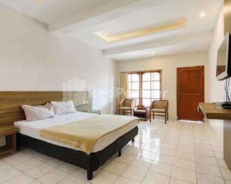 Pulau Bali Hotel Denpasar Mitra RedDoorz - Denpasar - Habitación