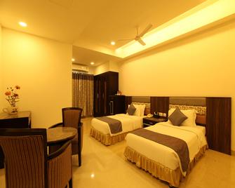 Hotel Southern Residency - Махабаліпурам - Спальня
