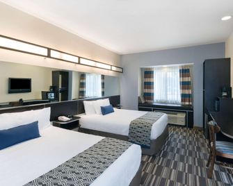 Microtel Inn & Suites by Wyndham Baton Rouge Airport - Baton Rouge - Schlafzimmer