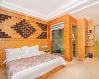 Gaobo Garden Hotel - Pu'er - Habitación