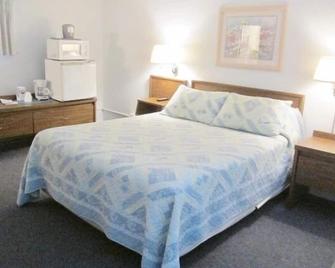 Country Squire Motel - Littleton - Bedroom