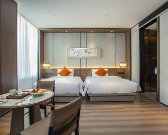 Slender West Lake Hot Spring Resort Yangzhou - האנגז'ו - חדר שינה