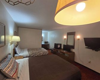 OYO Sandman Inn - Eagle Grove - Bedroom