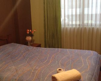 Hostal Flor de Kanela - Quito - Phòng ngủ
