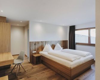 Familienhotel Lagant - Brand - Bedroom