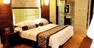 Guilin Jingxin International Hotel - גילין - חדר שינה