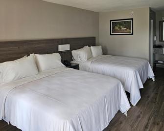 Quality Inn & Suites I-75 - Ocala - Habitación