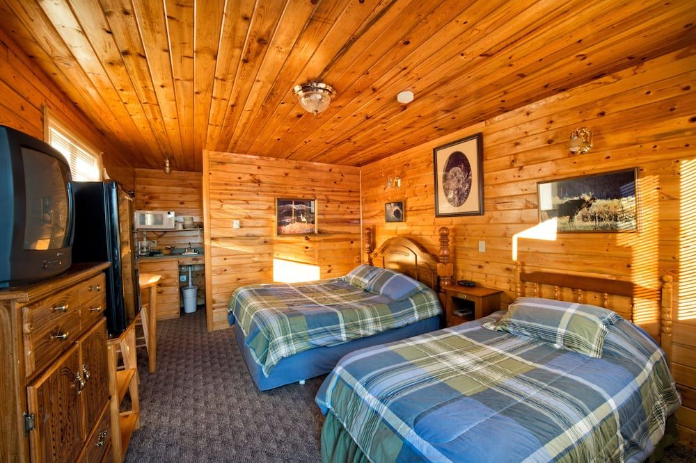 Wild Skies Cabin Rentals - Craig - Schlafzimmer