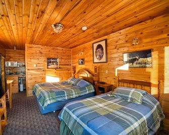 Wild Skies Cabin Rentals - Craig - Schlafzimmer