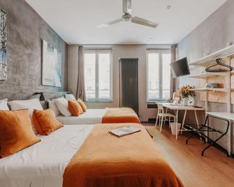 Hôtel Taggât - Lyon - Yatak Odası