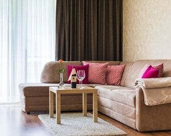 Apparthotel Alpenchalet - Neukirchen am Grossvenediger - Obývací pokoj