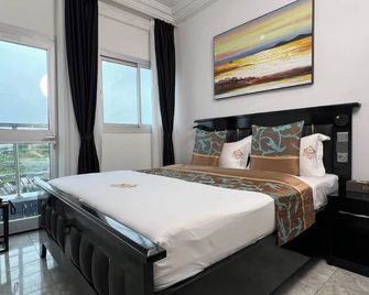 Hôtel Exotic Plaza - Douala - Bedroom