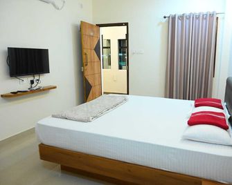 Hotel O Ashirvad Kokarne - Manipala - Slaapkamer