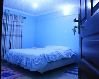 At Home With Karuris - Eldoret - Bedroom