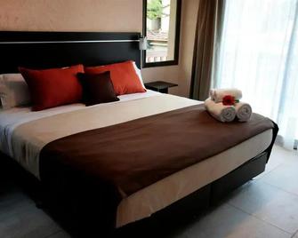 Blackstone Apart Boutique Hotel - Villa General Belgrano - Bedroom