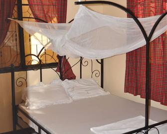 Dear my place is located at Bagamoyo Tanzania. Its a safe and memorable place. - Bagamoyo - Bedroom