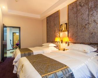 Guilin Panlong Boutique Hotel (Guilin Jinshan Square) - גילין - חדר שינה