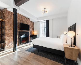 أوتل لو سان بول - كويبيك ستي - غرفة نوم