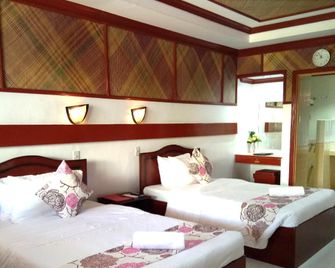 Paradise Island Park & Beach Resort - ดาเวา ซิตี้ - ห้องนอน