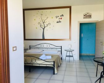 B&B Pizzomunno e Cristalda Rooms - Vieste - Bedroom