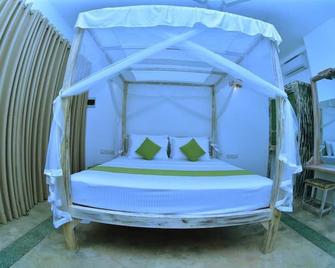 Aurora - אונוואטונה - חדר שינה