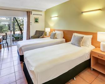 Coral Tree Inn - Cairns - Schlafzimmer